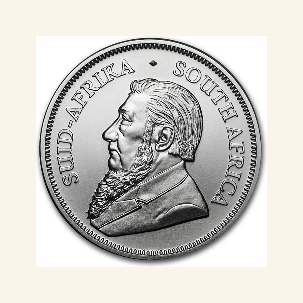 Close-up of South African 1 oz Silver Krugerrand coin with detailed portrait.